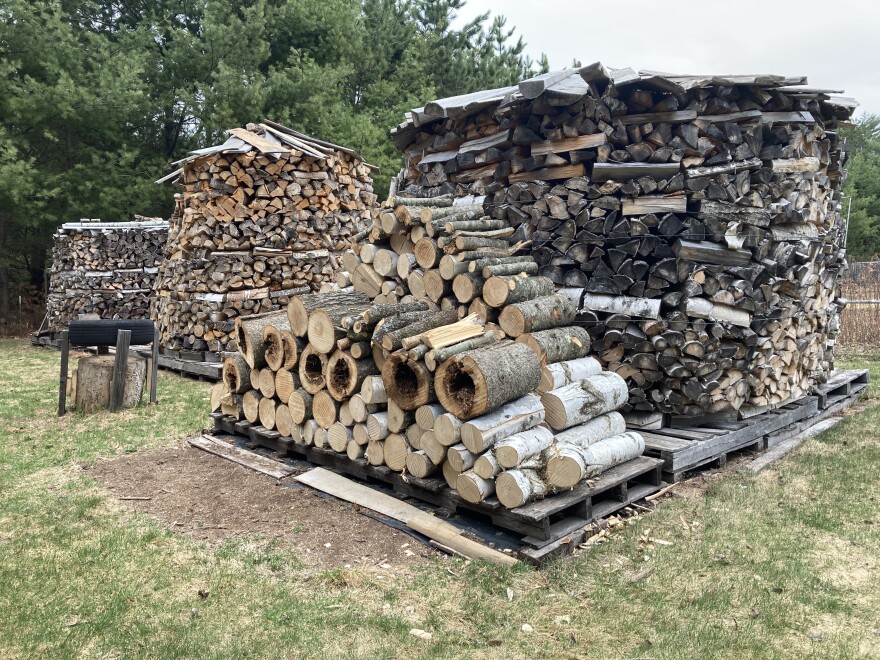 Mike Haasl keeps stacks of wood to heat his home.