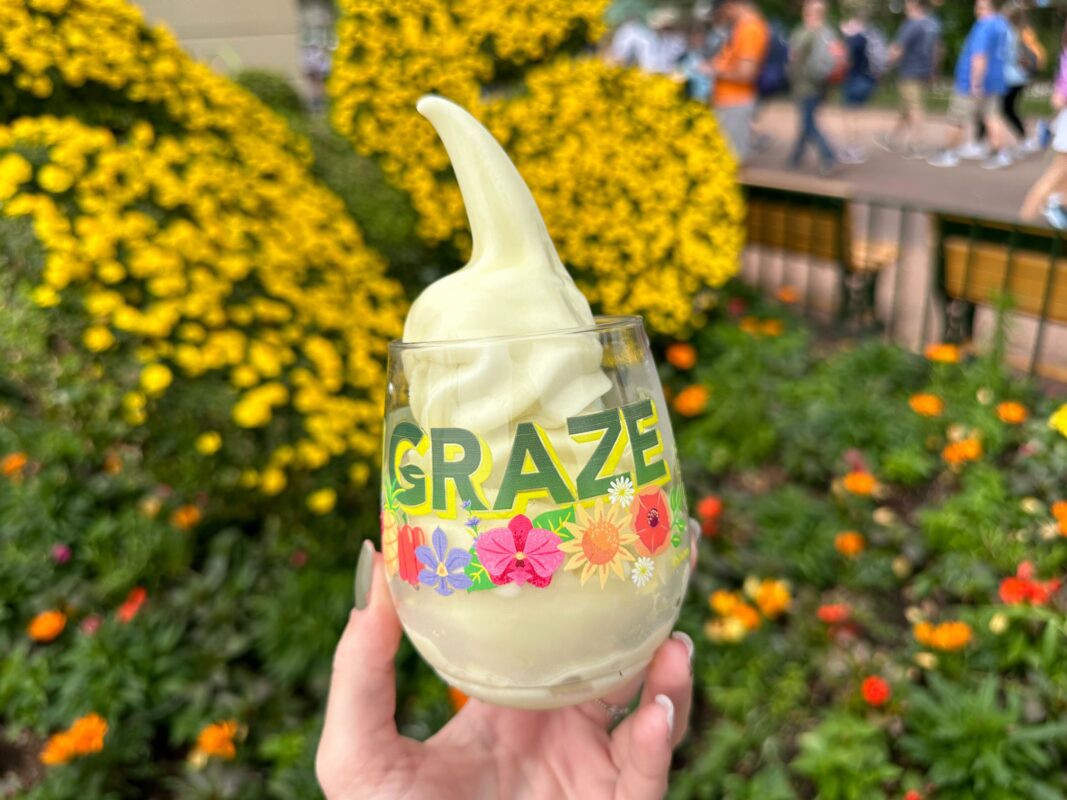 A reporter holds the grand prize treat for Garden Graze.