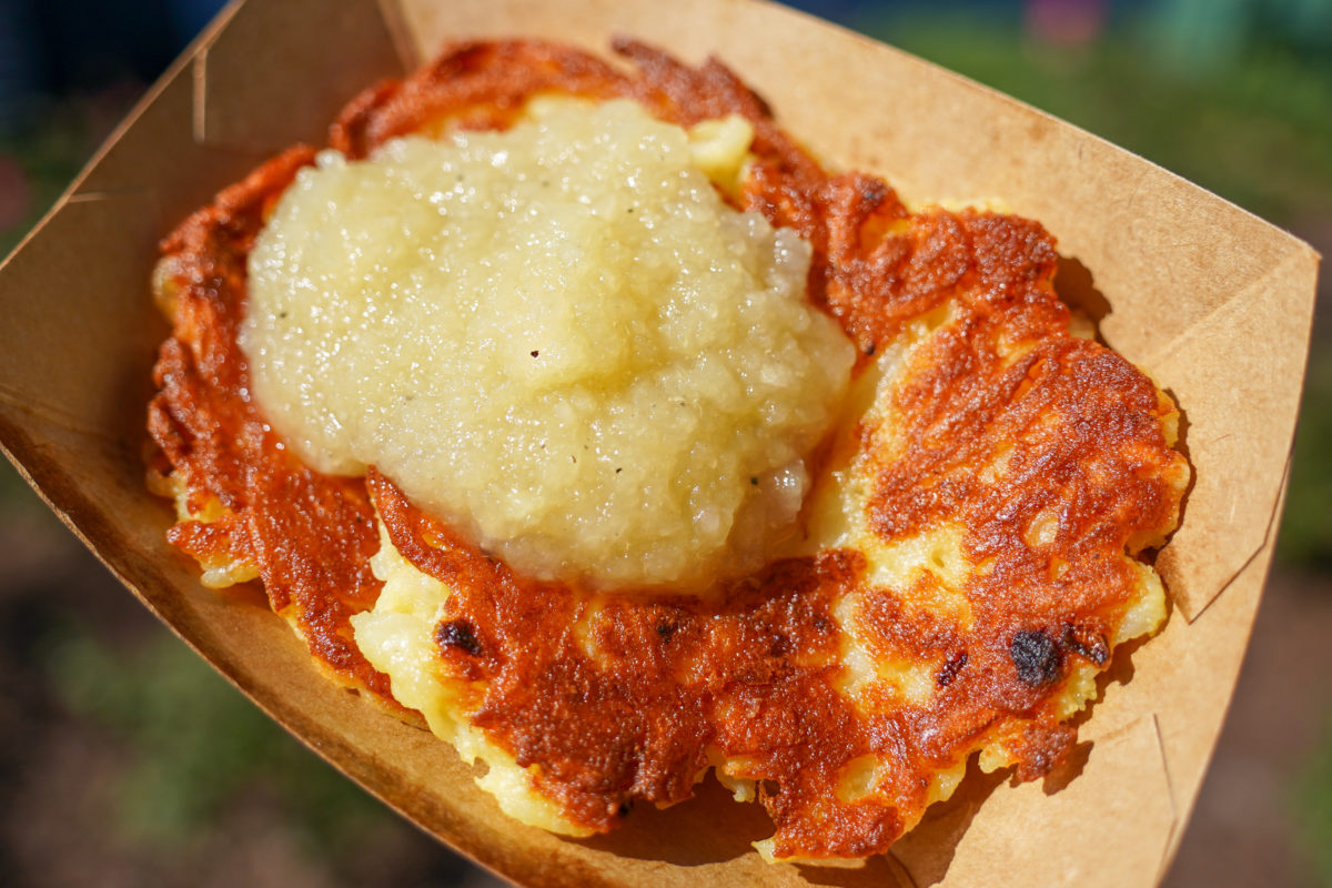 A close-up of the Potato Pancakes with House-made Apple Sauce from Bauernmarkt: Farmer's Market for Garden Graze.