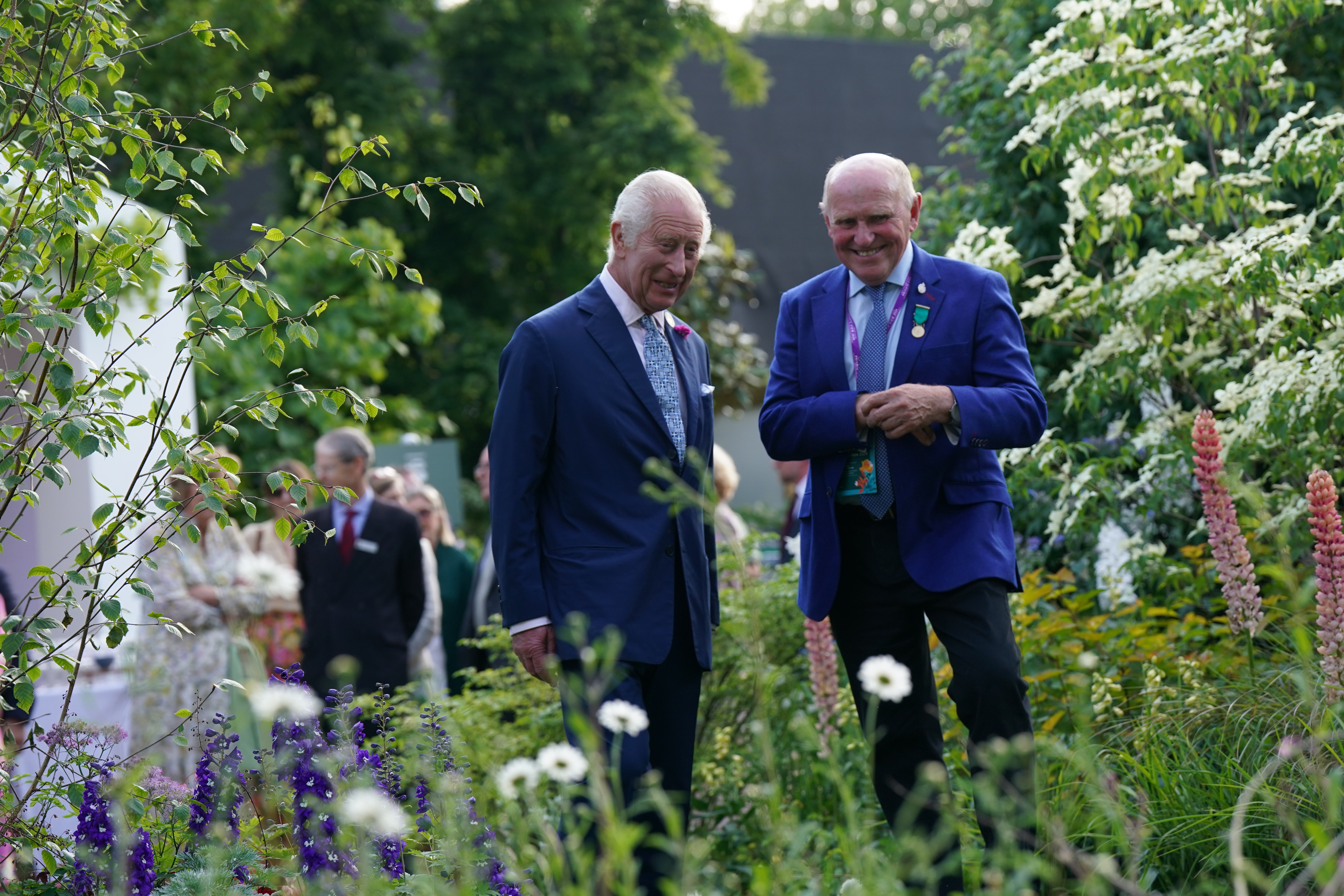 The King inspects some flowers during a tour of this year's RHS Chelsea Flower Show