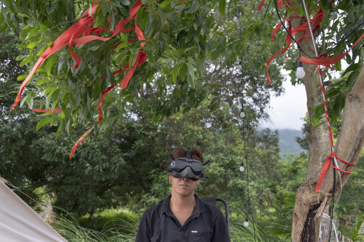 Drone pilot Thanh Sang tests a visor-based photographic drone in his free time. 